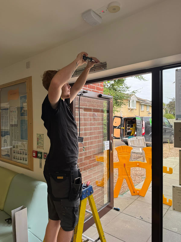 Swing door installation at an NHS Trust