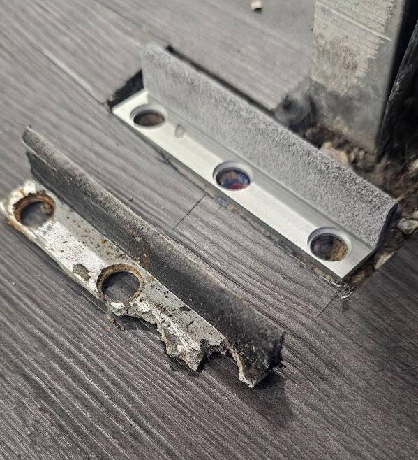 Broken commercial door component