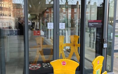 What are the benefits of installing an automatic door?